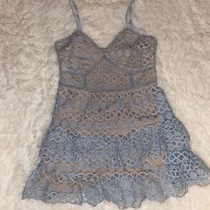 Never been work NWOT light blue lace cocktail dress with skin tone lining